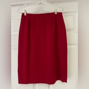 Brand new East 5th women’s suit pencil skirt in Garnet, size 6P. Fully lined.